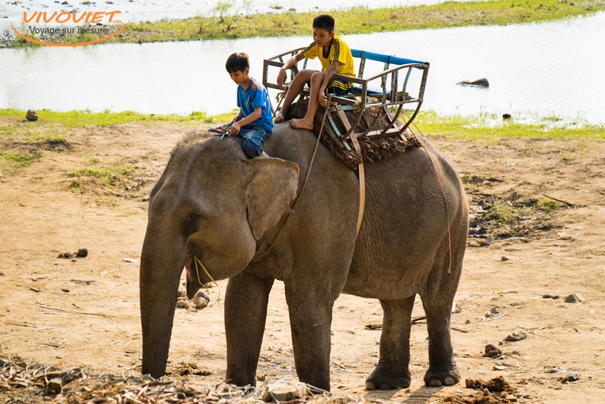 Dak Lak, Vietnam – Mar 29, 2016: Children ride elephant in Don v